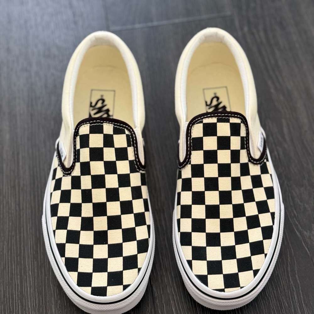 Vans Black and Cream Checkered Slip-On Sneakers